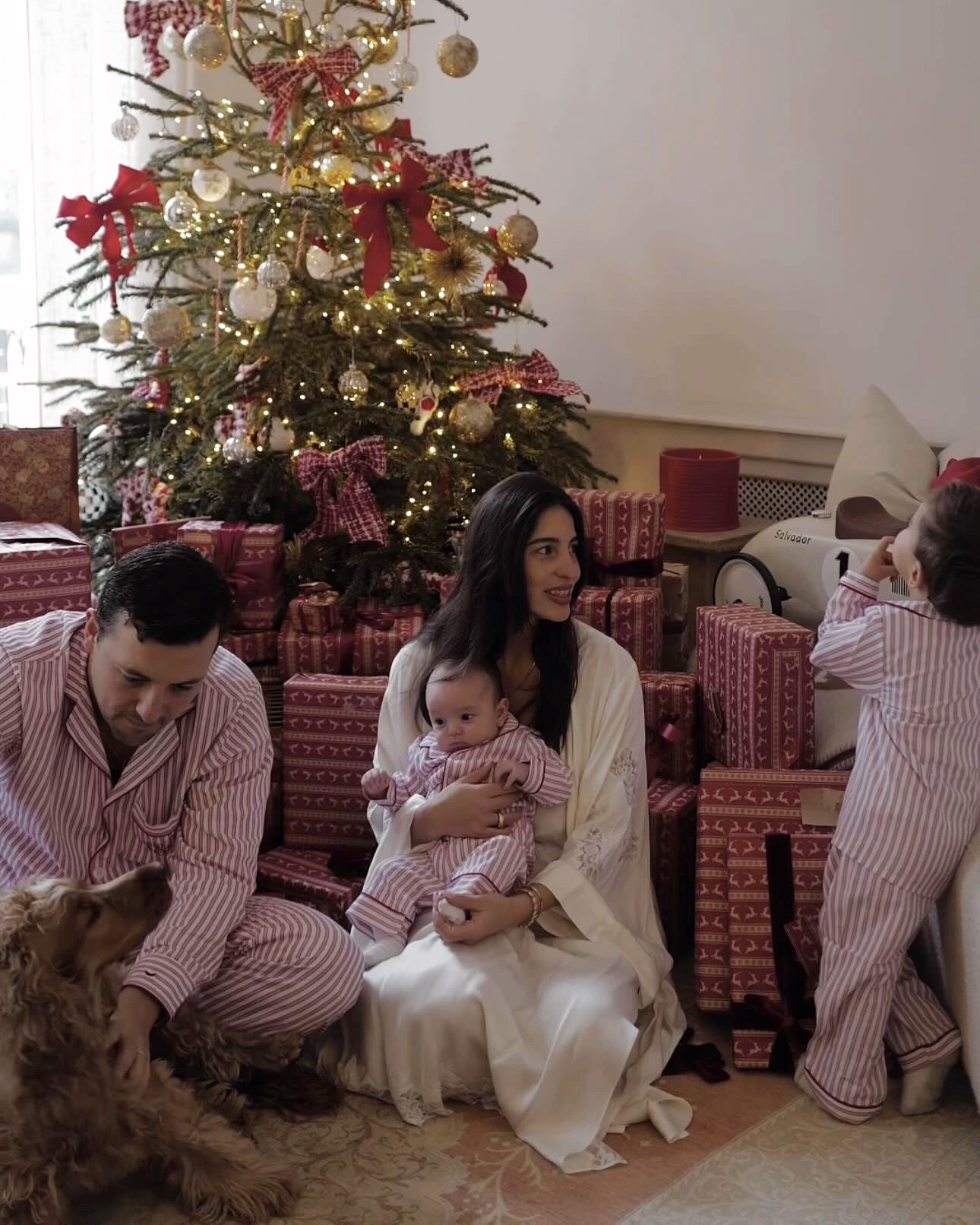 Bettina Looney and sons next to Christmas tree