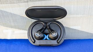 JLab Epic Air ANC 2 headphones in charging case on a cloth background