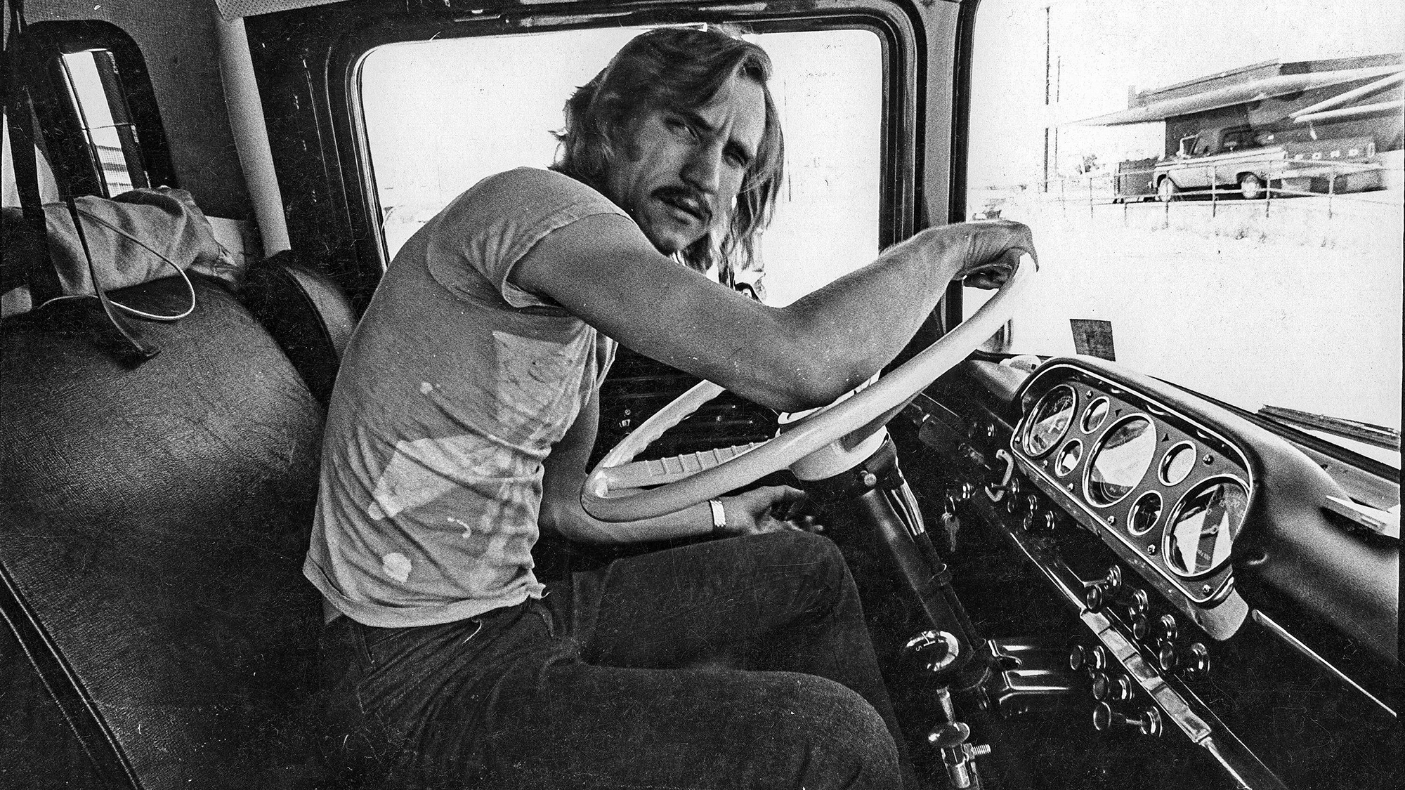 Joe Walsh of the rock band "Eagles" poses for a portrait in a truck in circa 1976.
