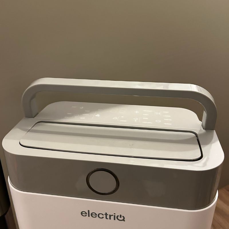 ElectricQ dehumidifier top of machine showing handle sitting upright