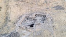 an aerial view of an excavated building