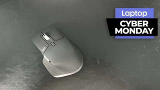 Logitech MX Master 3S on a leather mouse mat with a Cyber Monday banner in the upper-right corner