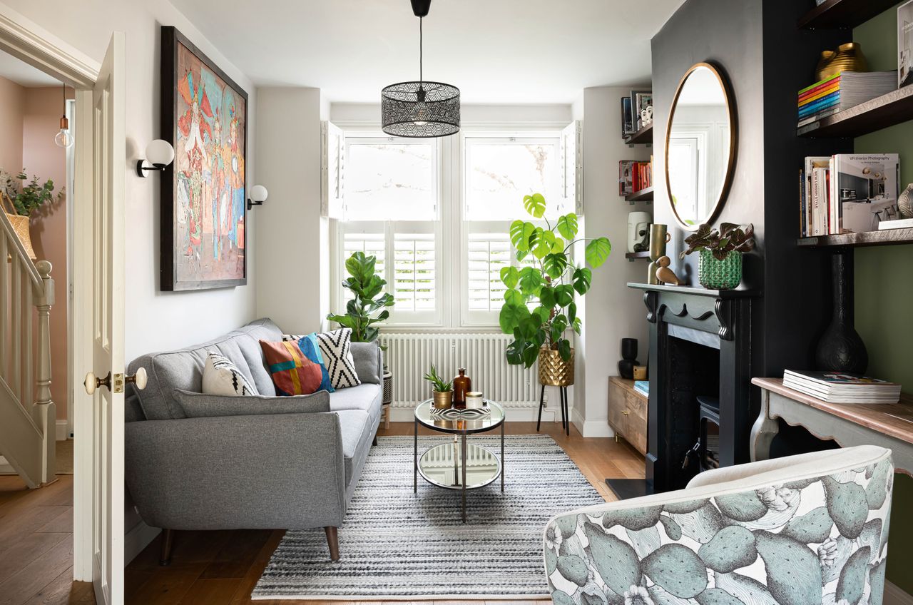 Narrow living room ideas like this intentional and bright space with slim coffee table by Veronica Garcia Rodriguez make the most of awkward spaces