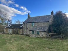 The existing cottage and barn at the site is ready to be transformed to an off-grid oasis.