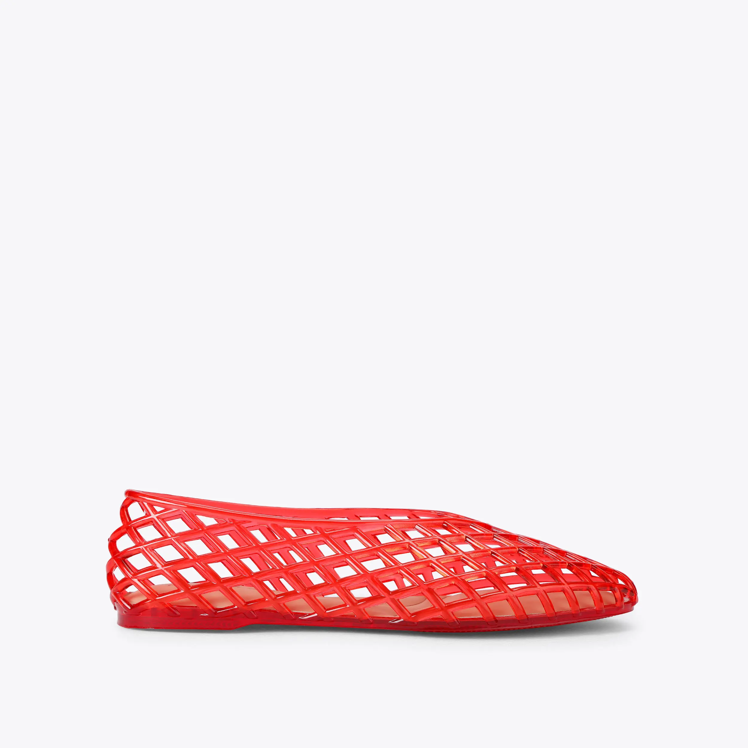 A pair of red Kurt Geiger jelly flats.