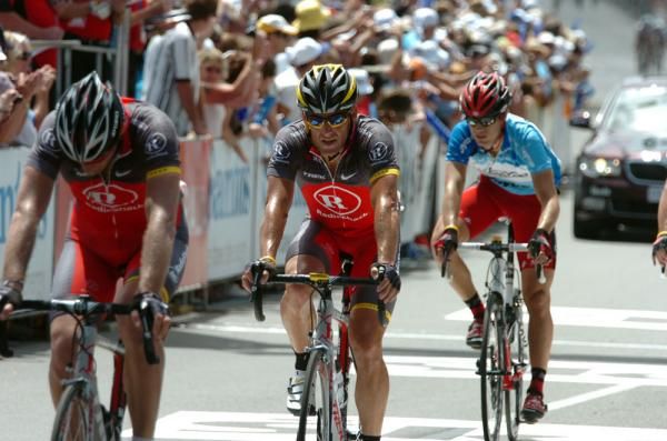 Lance Armstrong (RadioShack) rolls across the finish line