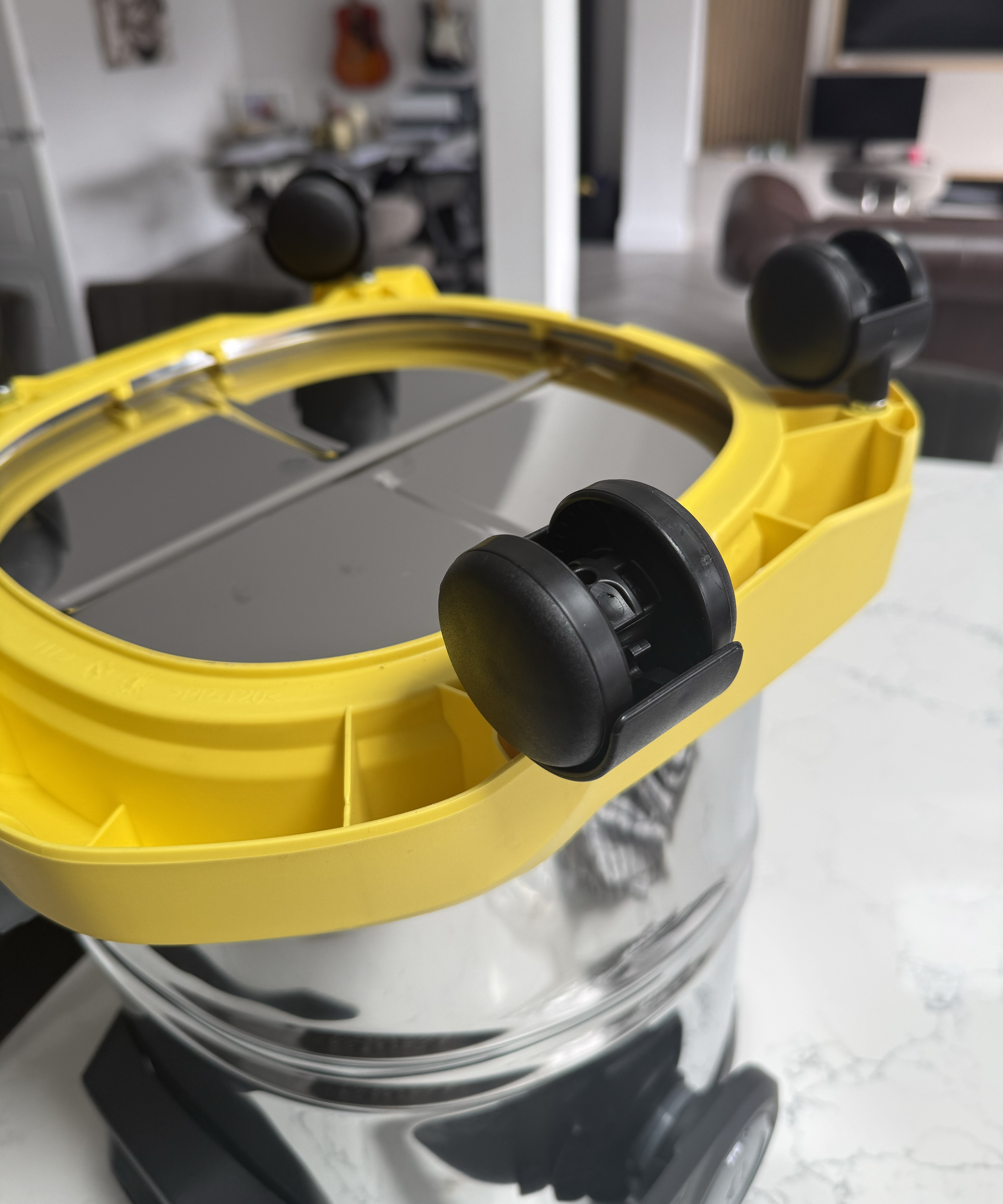 K&amp;auml;rcher WD 6 P wet and dry vacuum cleaner base with black castor wheels and yellow top section