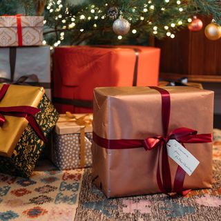 christmas gifts with designed wrap and ribbon