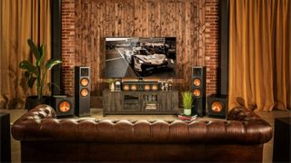 Two Klipsch SPL-120 300W Powered Subwoofers displayed as part of wider Klipsch home theater system