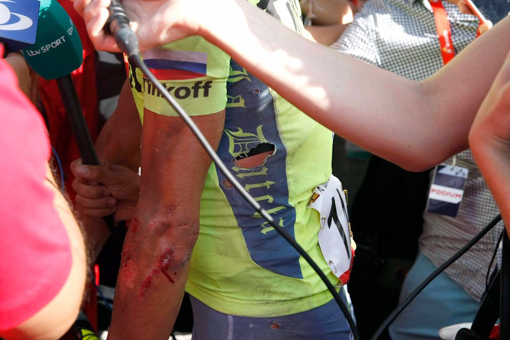 Alberto Contador speaks with reporters following his stage 7 crash at the Vuelta.