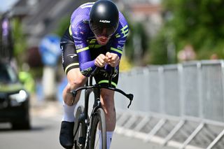 Ollie Jones racing a time trial bike for Bolton Equities BlackSpoke team