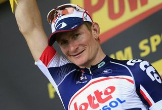 A beaming Andre Greipel on the podium after winning stage 5 at the Tour de France.