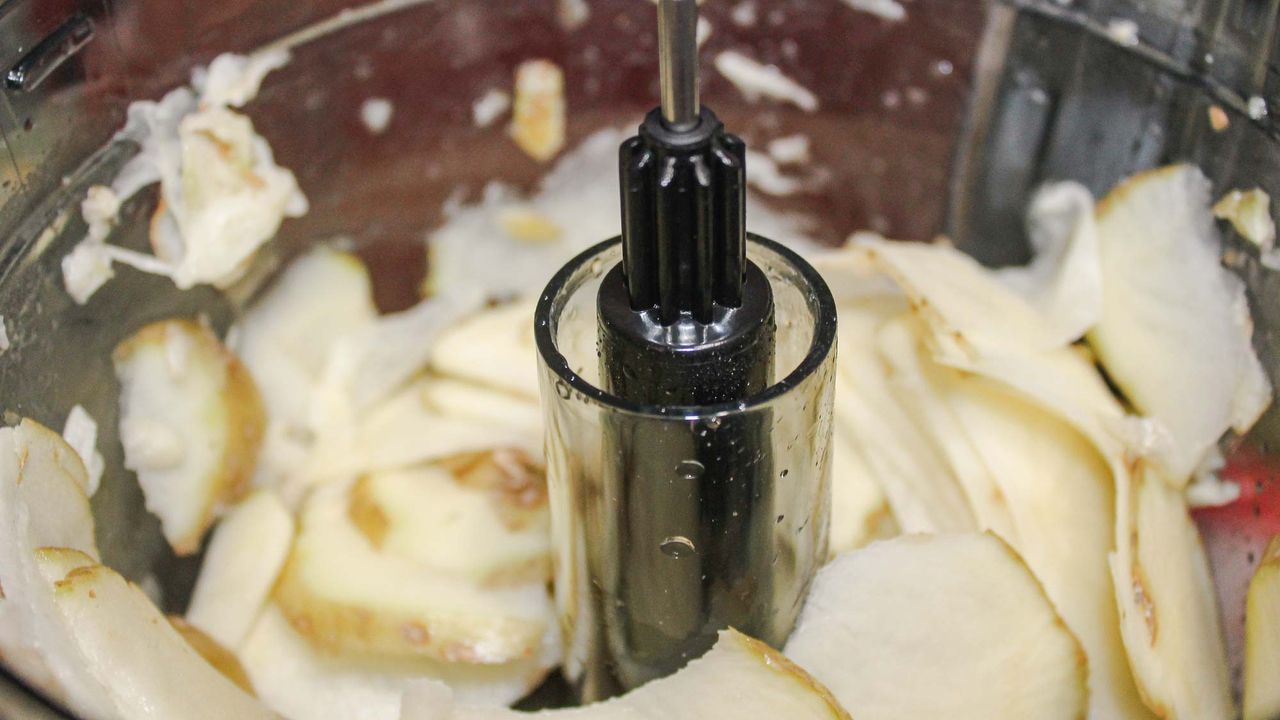 Crux 8 Cup Food Processor processing potatoes