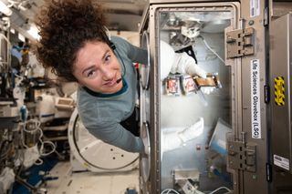 NASA astronaut Jessica Meir works with bone samples inside the Life Science Glovebox located in JAXA's Kibo laboratory at the International Space Staion, on March 3, 2020.
