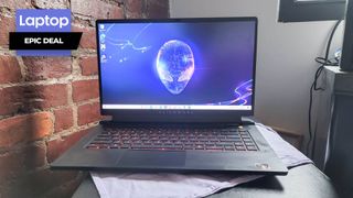 Alienware m15 gaming laptop with alien head logo desktop