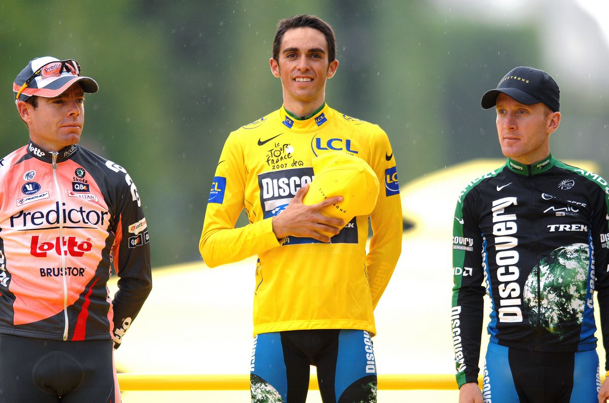 Cadel Evans, left, on the final 2007 Tour podium