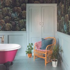 Bathroom with rattan chair in the corner