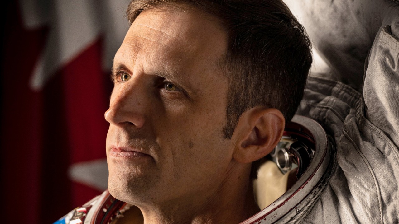 an astronaut in a white spacesuit