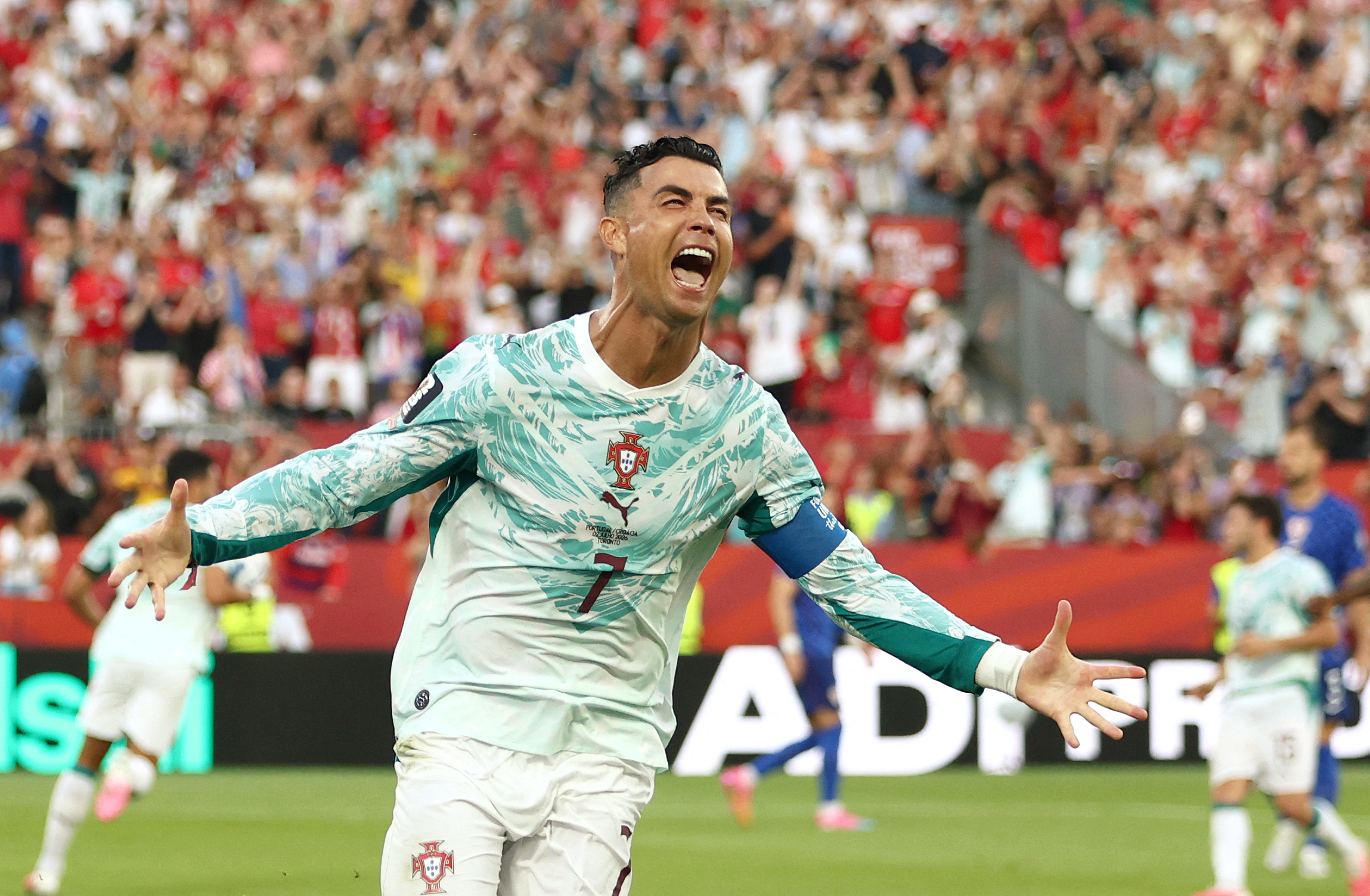 Portugal's forward #07 Cristiano Ronaldo celebrates after scoring his team's first goal from the penalty spot during the 2026 World Cup round of 32 football match between Portugal and Croatia at the Toronto Stadium in Toronto on July 2, 2026. (Photo by Cole Burston / AFP)