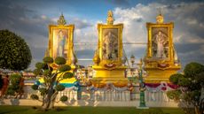 Portraits of the Thai royal family at the Wat Arun temple in Bangkok. 