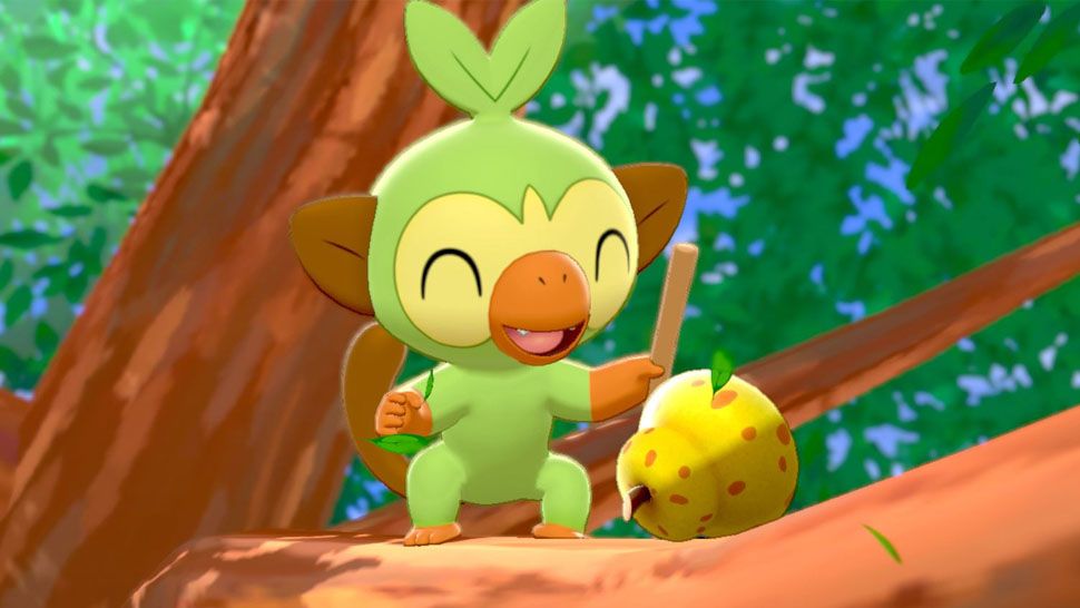 Pokemon Sword and Shield: Grookey in a tree with a berry