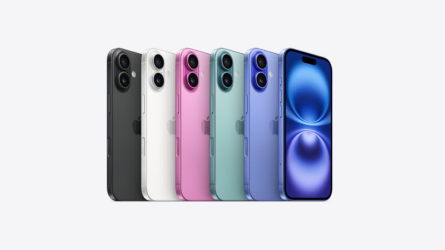 Image of six iPhone 16s lined up alongside each other to show the five different colours available from the back with one of them turned around to show the front