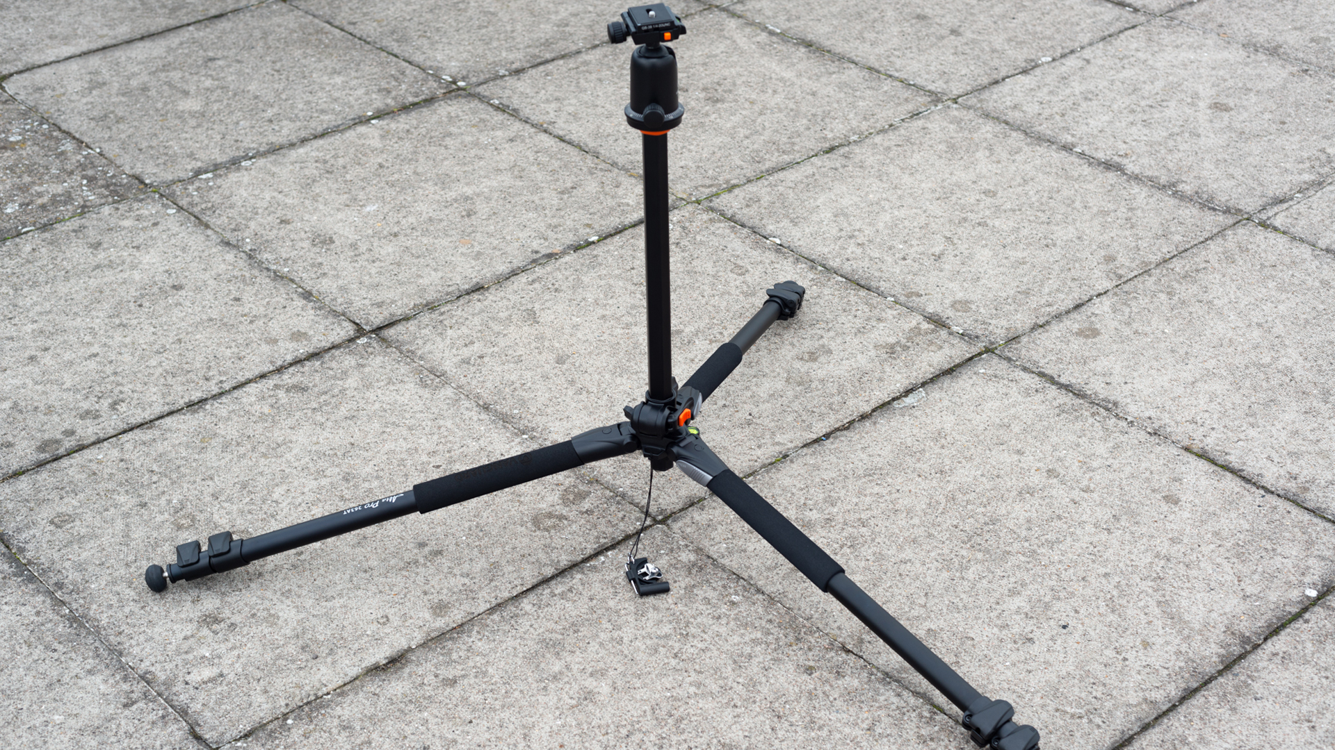 Image shows a Vanguard Alta Pro 263AB on a patio.