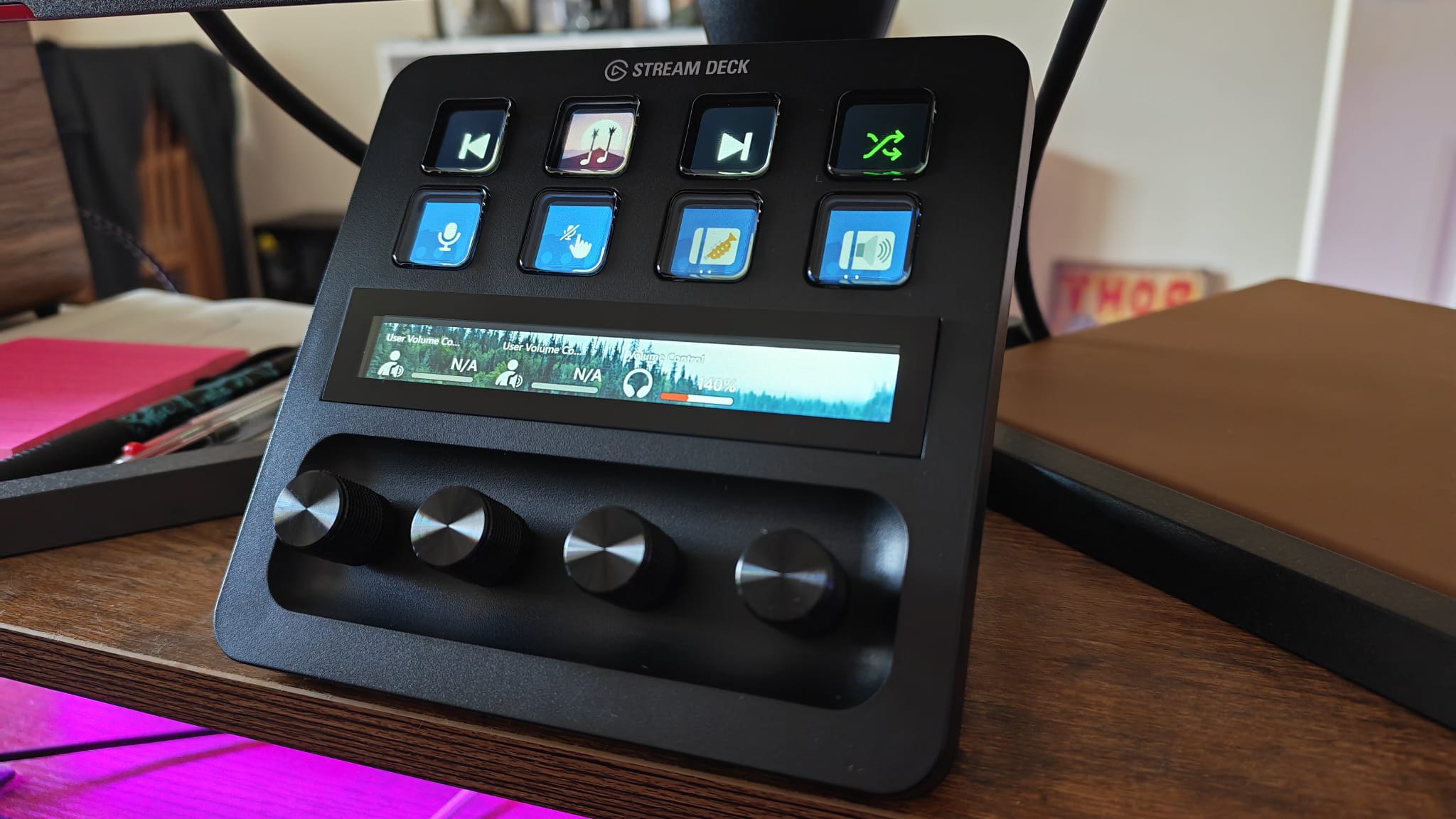 A Stream Deck Plus on a gaming desk