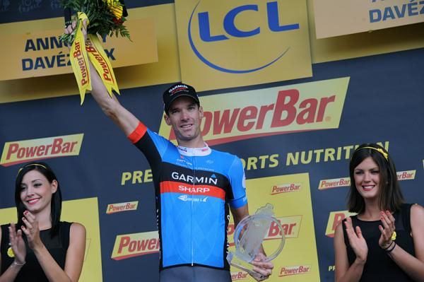 David Millar (Garmin-Sharp) on the podium after winning stage 12 from a breakaway.