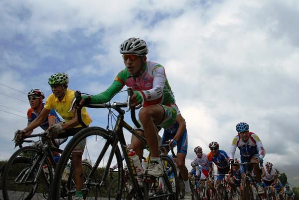 Race leader Fernando Camargo (Boyaca Orgullo De America), yellow jersey, at the head of the peloton.