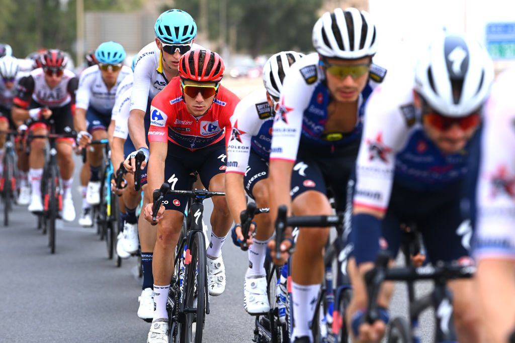 Remco Evenepoel sits behind his teammates