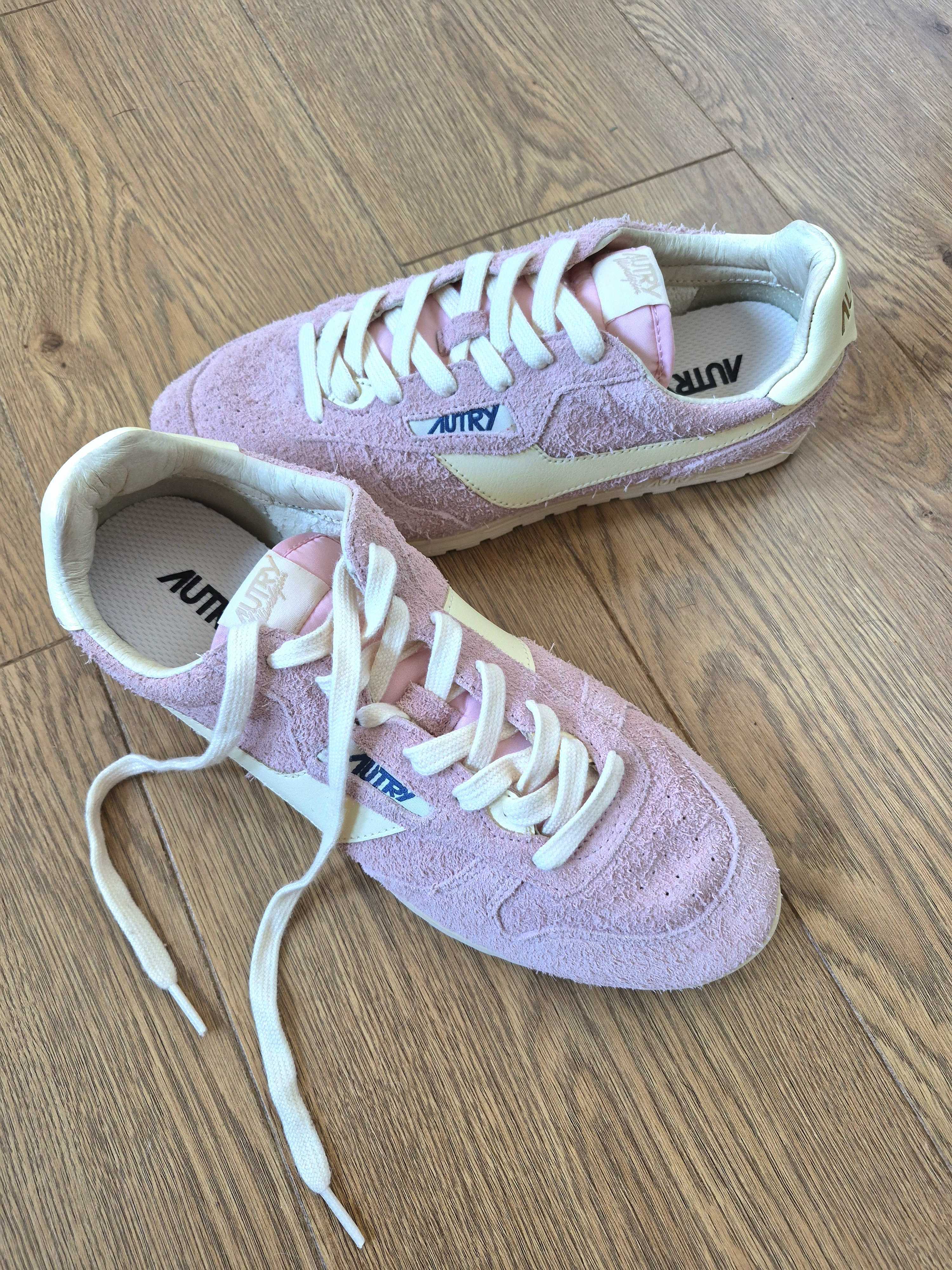 Image of Remy Farrell's pink trainer trend. In the images is her pink Autry trainers.