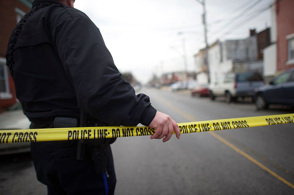 A barrier tape several blocks away from the scene of the shooting 