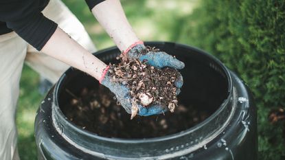 making compost in a compost bin
