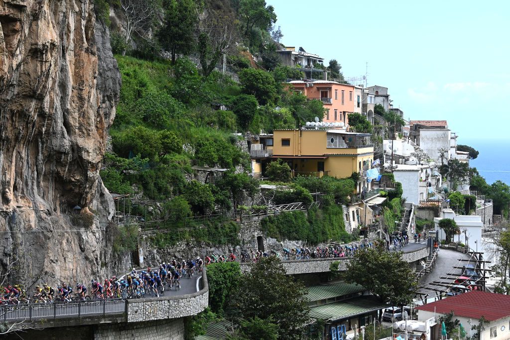 NAPLES ITALY MAY 11 A general view of the peloton passing through Sorrento Village during the 106th Giro dItalia 2023 Stage 6 a 162km stage from Naples to Naples UCIWT on May 11 2023 in Naples Italy Photo by Tim de WaeleGetty Images