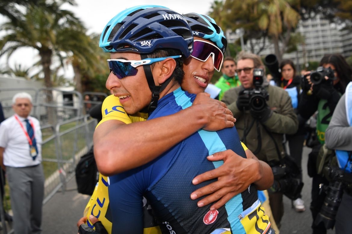 Egan Bernal hugs Ivan Sosa