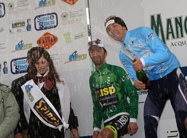 Race winner Matteo Montaguti (De Rosa - Stac Plastic) uncorks the champagne.