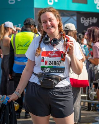 Jadie at the finish line of the Big Half after completing her 5km leg