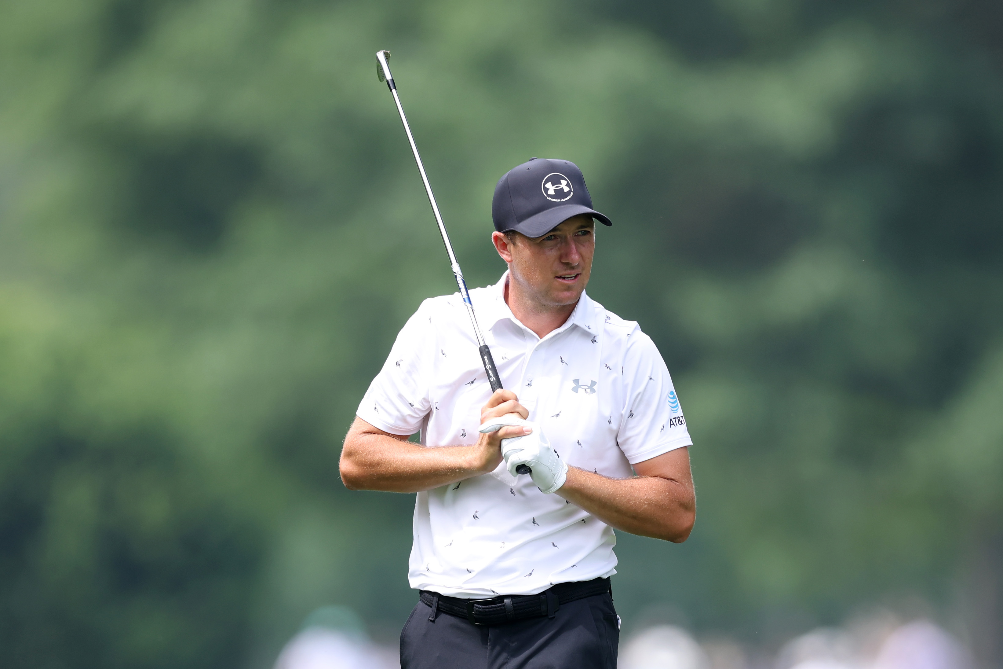 Jordan Spieth watches his approach to the green
