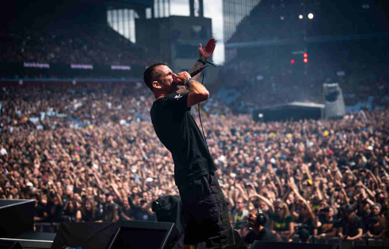 Lamb Of God&amp;rsquo;s Randy Blythe performing onstage at the Back To The Beginning show at Villa Park in July 2025