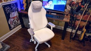 The Secretlab Titan Evo NanoGen in white in front of a desk