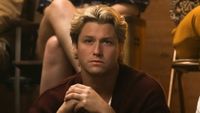 Stephen Kalyn as Dean Di Laurentis sitting in deep thought in Off Campus