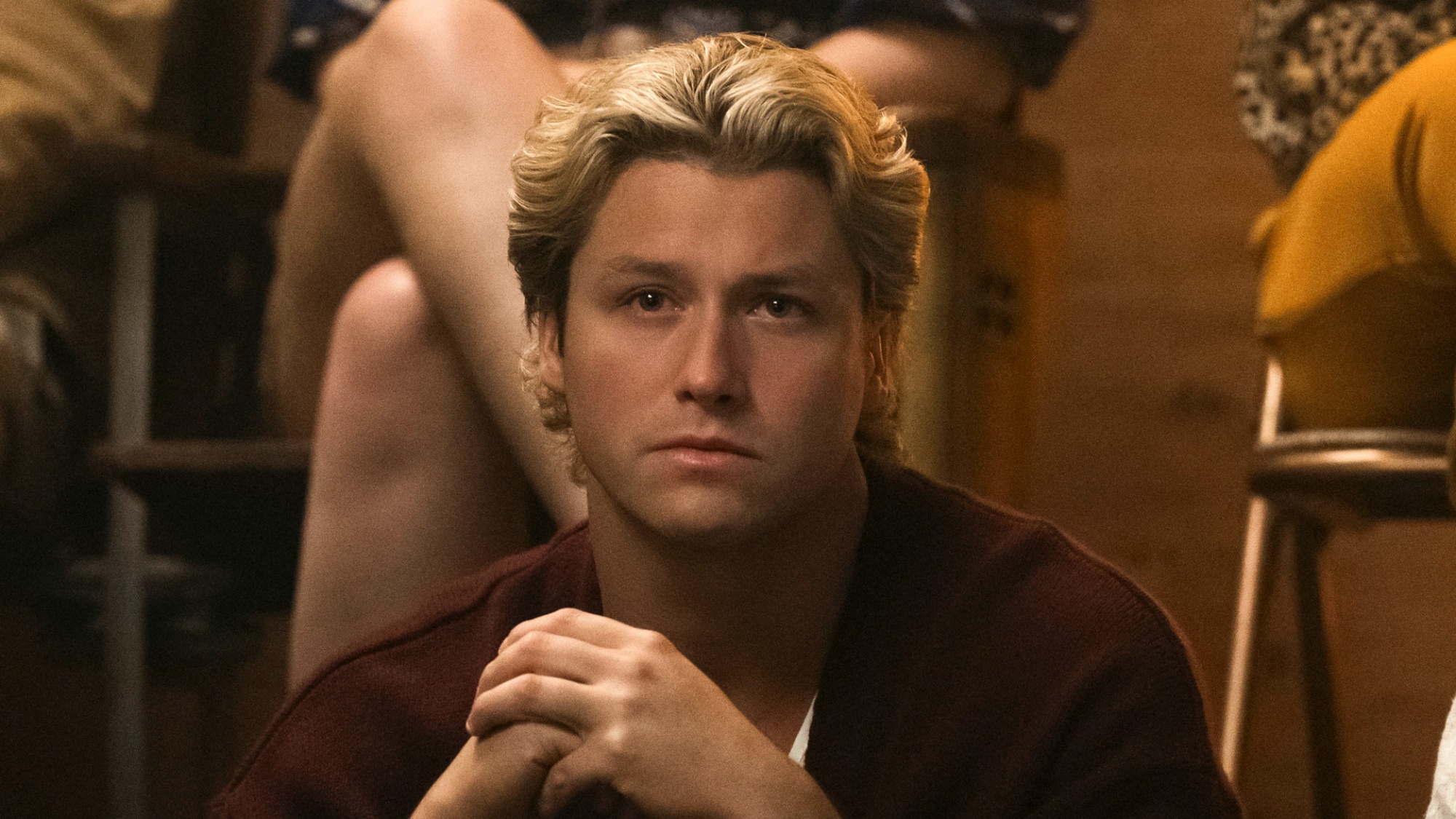Stephen Kalyn as Dean Di Laurentis sitting in deep thought in Off Campus