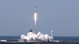 A SpaceX Falcon 9 rocket launches 60 Starlink internet satellites into orbit from Pad 39A of NASA's Kennedy Space Center in Cape Canaveral, Florida on April 22, 2020.