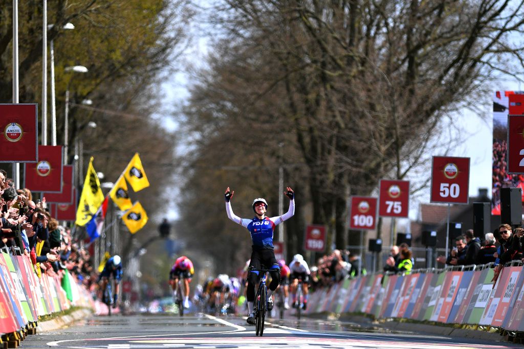 VALKENBURG NETHERLANDS APRIL 10 Marta Cavalli of Italy and Team FDJ Nouvelle Aquitaine Futuroscope celebrates winning ahead of Demi Vollering of Netherlands and Team SD Worx Liane Lippert of Germany and Team DSM and Annemiek Van Vleuten of Netherlands and Movistar Team during the 8th Amstel Gold Race Ladies Edition 2022 a 1285km one day race from Maastricht to Valkenburg UCIWWT AGR2022 on April 10 2022 in Valkenburg Netherlands Photo by Luc ClaessenGetty Images
