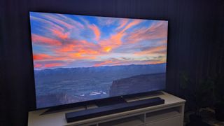 Samsung QN990F with sunset on screen