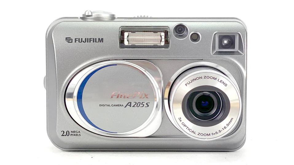 A silver Fujifilm FinePix A205S digital camera featuring a 2.0-megapixel sensor and a 3x optical zoom Fujinon lens