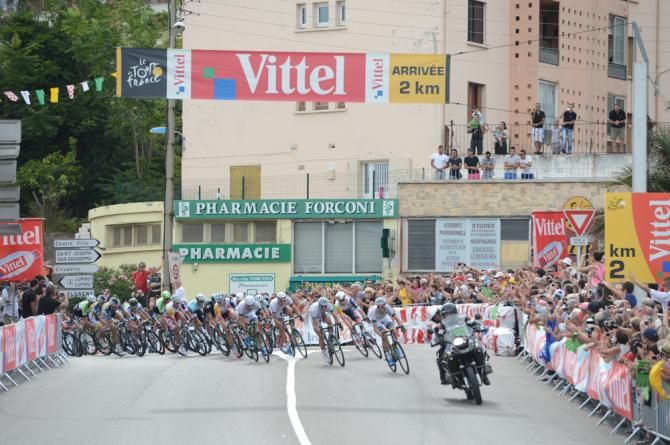 Argos lead the peloton towards the line after a huge crash