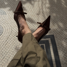 Woman wearing Prada heels