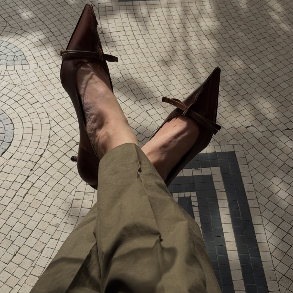 Woman wearing Prada heels